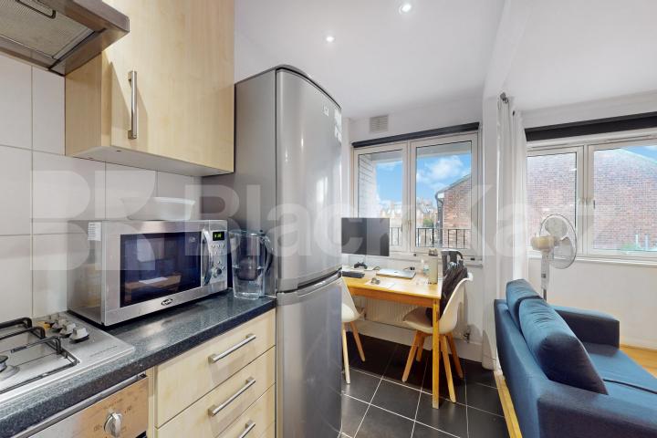 Top floor double studio with south facing balcony Tisdall House Barlow Street , Elephant and Castle